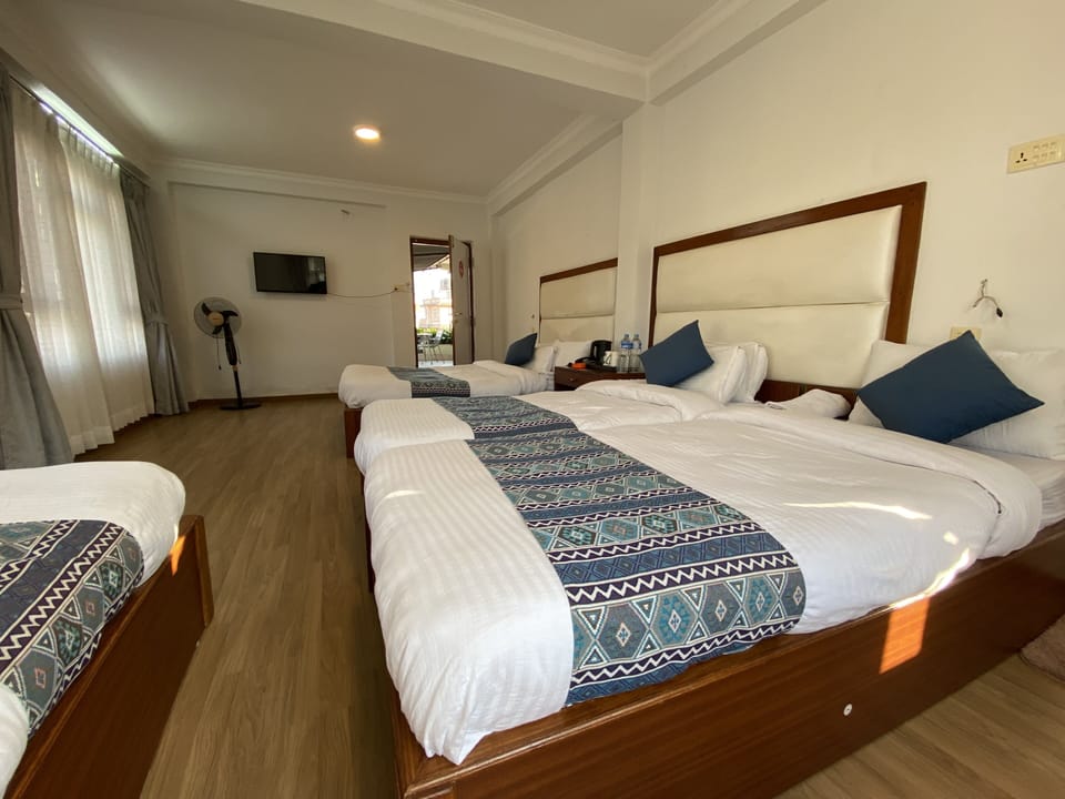 Family Quadruple Room | Desk, free WiFi, bed sheets