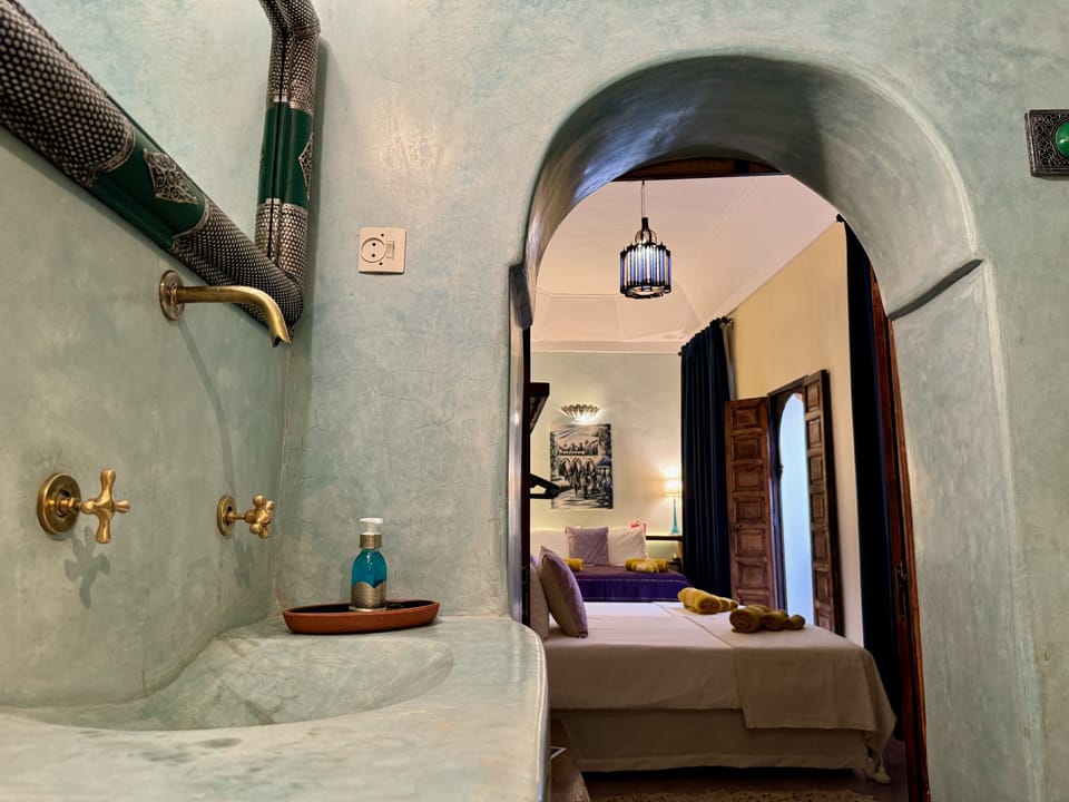 Superior Quadruple Room | Bathroom | Shower, hair dryer, towels, soap