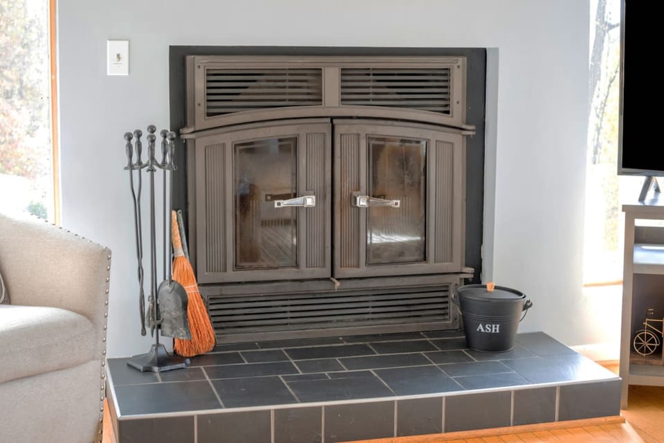The wood stove can heat the entire home from late fall to early Spring. You're in the mountains... take advantage of it!