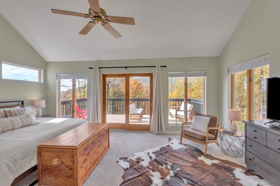 Primary bedroom is upstairs with king bed and large patio