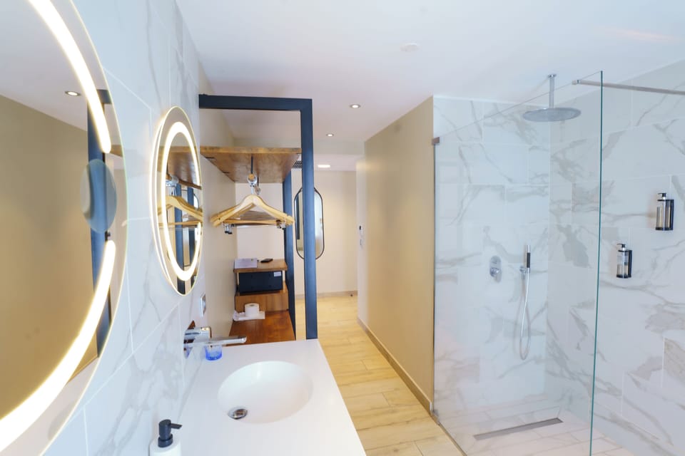 Eco-friendly toiletries, hair dryer, towels