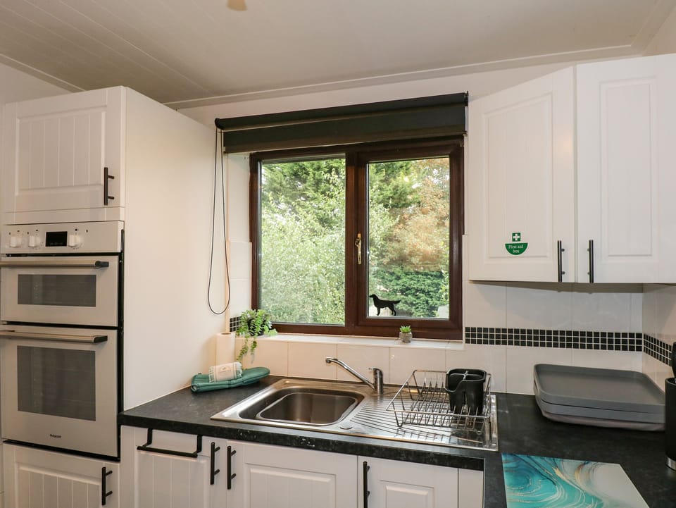 Fridge, electric kettle, toaster, cookware/dishes/utensils