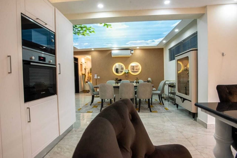 Family Apartment | Living area | 24-inch Smart TV with satellite channels