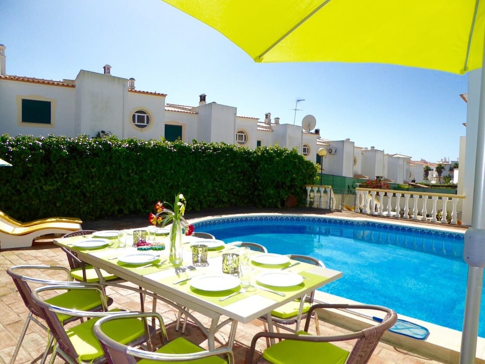 With pool and dining table