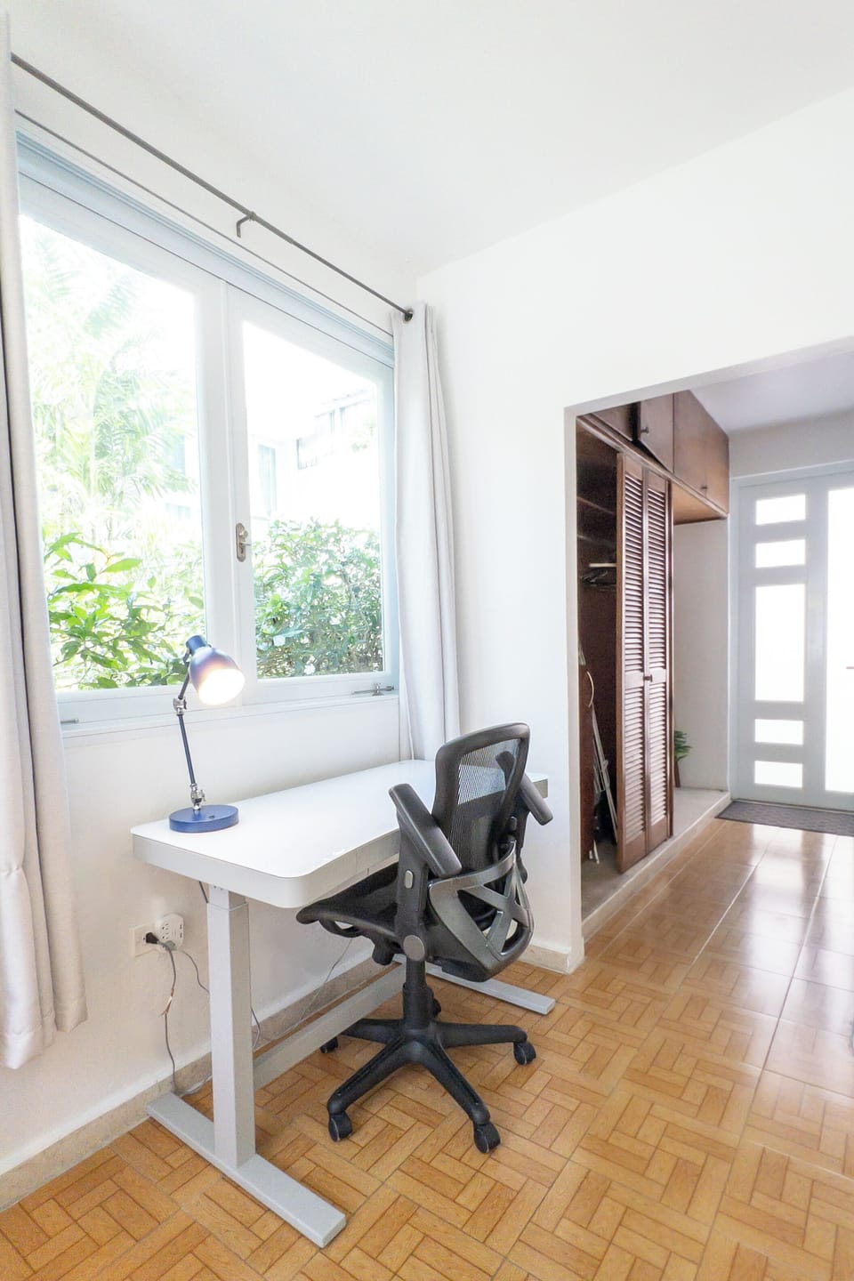 Master bedroom: Adjustable height desk, ergonomic chair, and fiber optic wifi