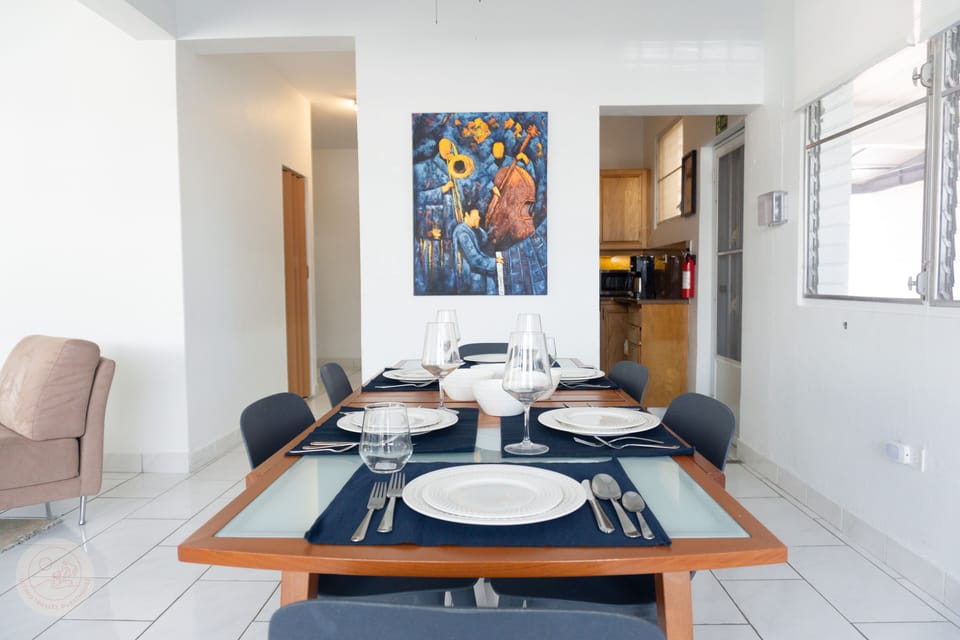 Dining table seats 6 and can be expanded to add a child's highchair