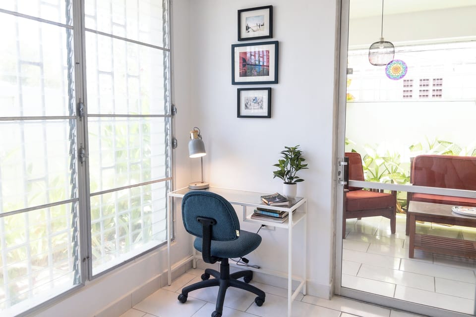 One of 2 dedicated workspaces located in the living room