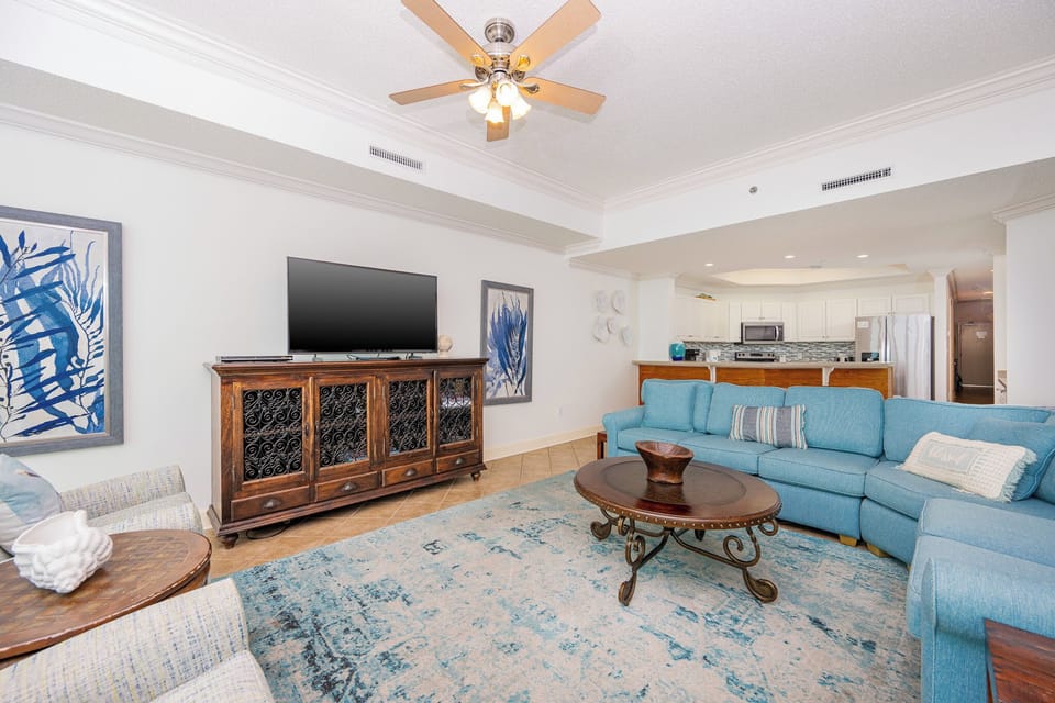 Relax in the inviting living area, perfect for family movie nights or enjoying a game day together