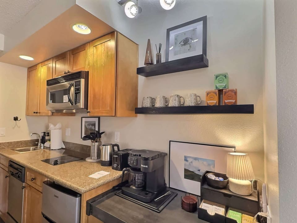 【Kitchenette】Stocked kitchenette — stove, fridge, microwave, dishwasher & extra touches
Listed with @BookTraverse
