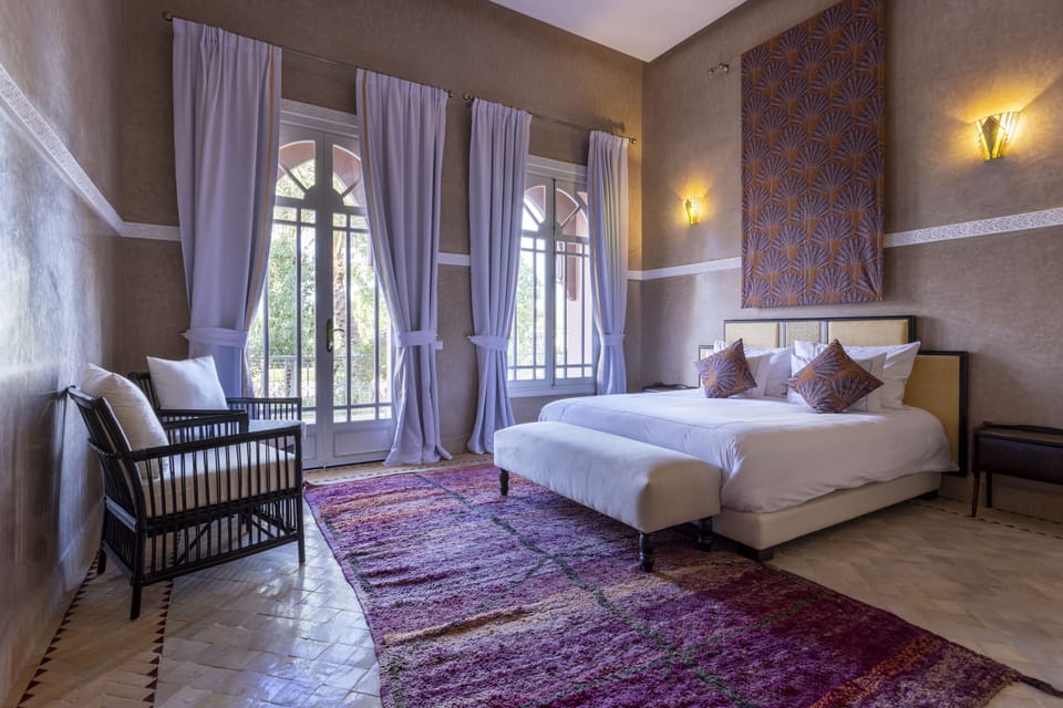 Deluxe Room | 1 bedroom, in-room safe, individually decorated, individually furnished
