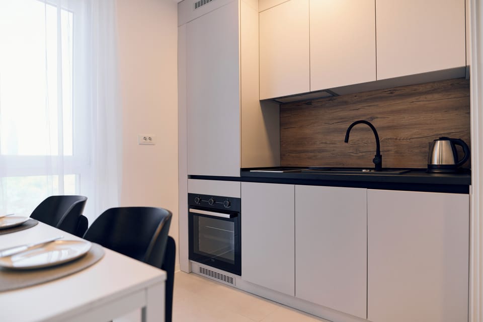 Studio apartment with balcony - sea side | Private kitchen | Full-size fridge, oven, stovetop, dishwasher