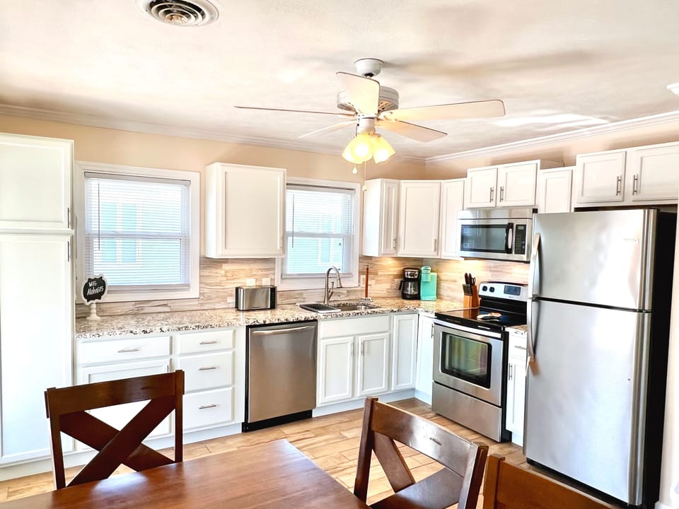 Updated kitchen with stainless steel appliances.  