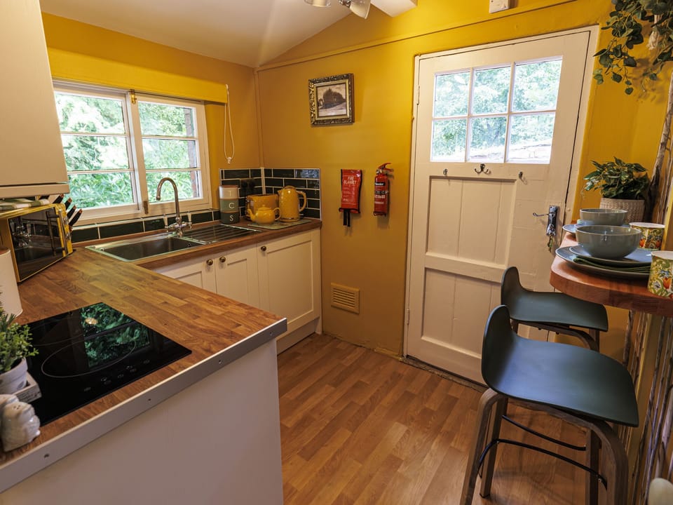 Fridge, electric kettle, toaster, cookware/dishes/utensils
