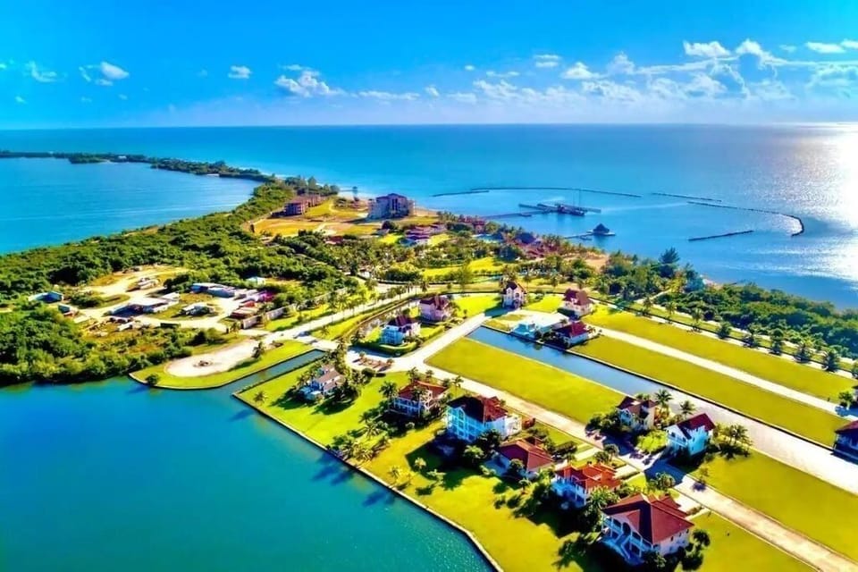 Areal view of the lagoon-front neighborhood and beachfront resort on the sea 