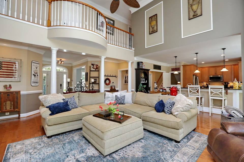 Open concept living area. Comfy Deep sectional Couch! A guest Favorite!! 