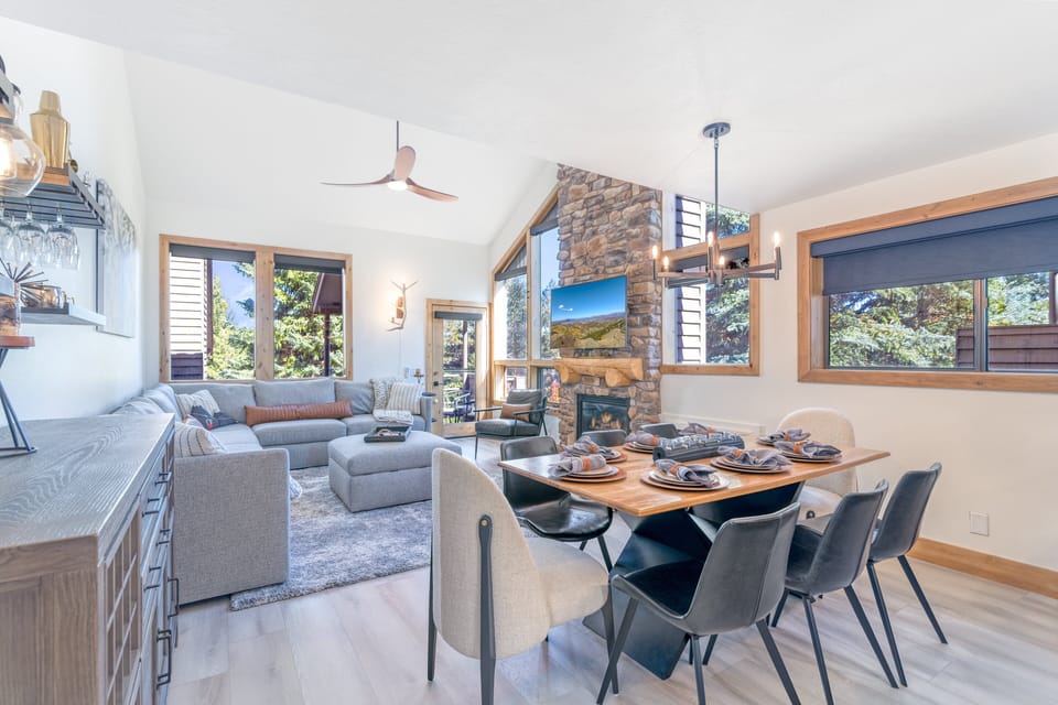 The open-concept great room invites connection, from fireside conversations to shared meals.