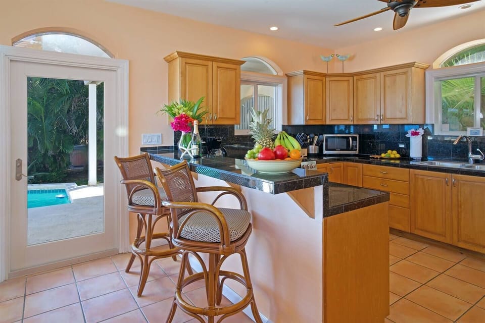 Bar seating in the kitchen is a great place for a light breakfast.
