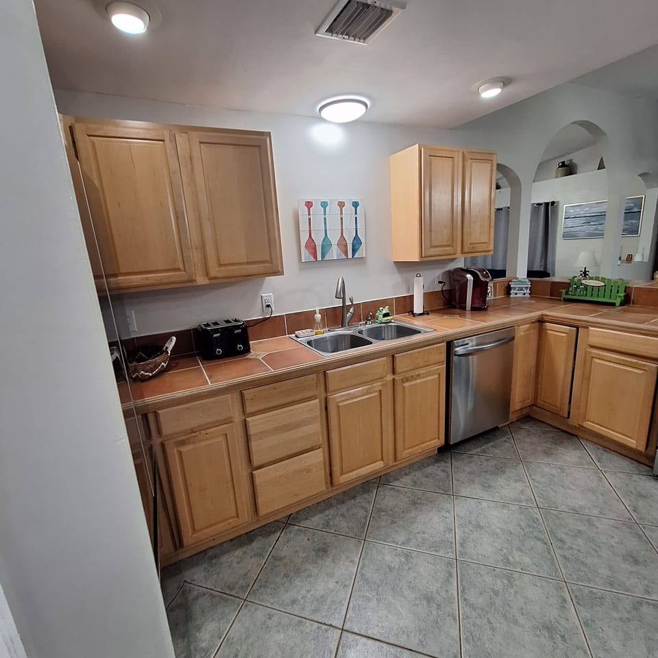 View from third bedroom into kitchen