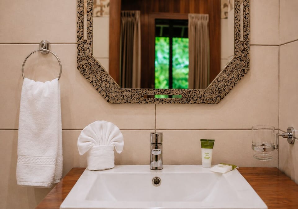 Rustic Cabins | Bathroom | Shower, rainfall showerhead, towels