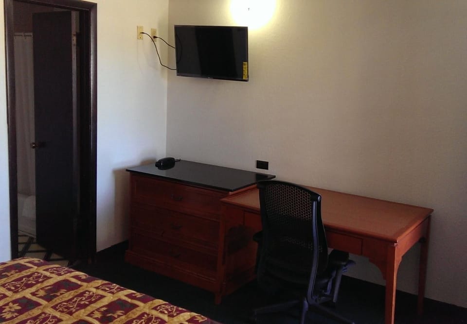 Desk, laptop workspace, WiFi (free), bed sheets