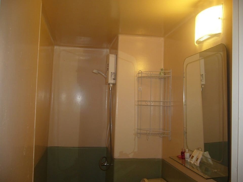 Standard Triple Room, Private Bathroom | Bathroom | Shower, free toiletries, hair dryer, towels