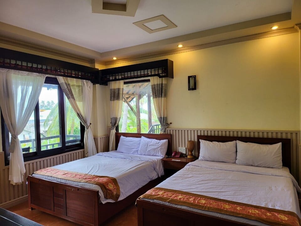 Superior Quadruple Room, Garden View | Minibar, in-room safe, soundproofing, WiFi (free)