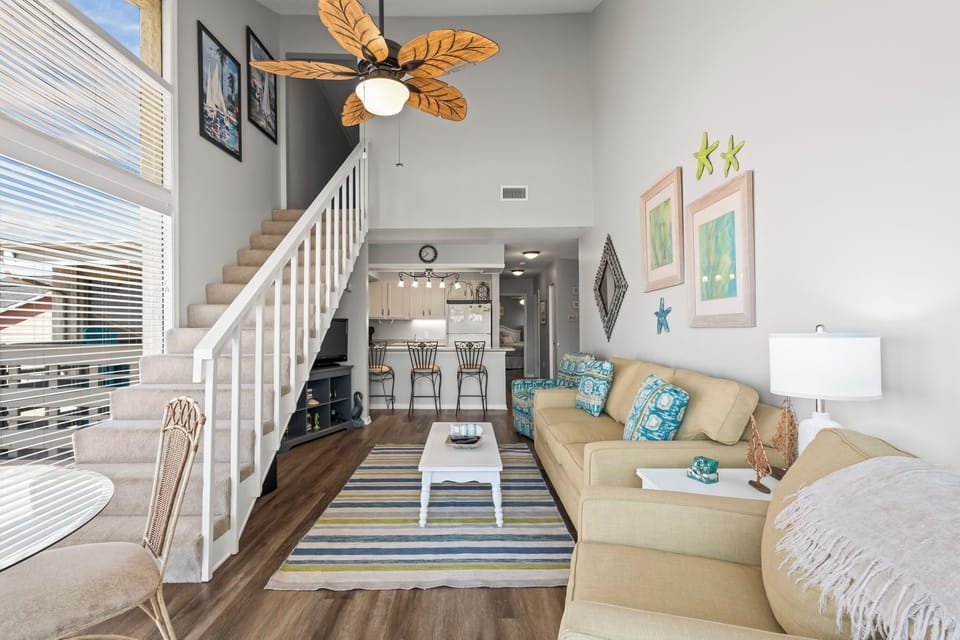 The Village 13D Living area into Upstairs