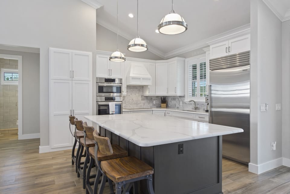 Take a seat on a barstool at this awesome island.