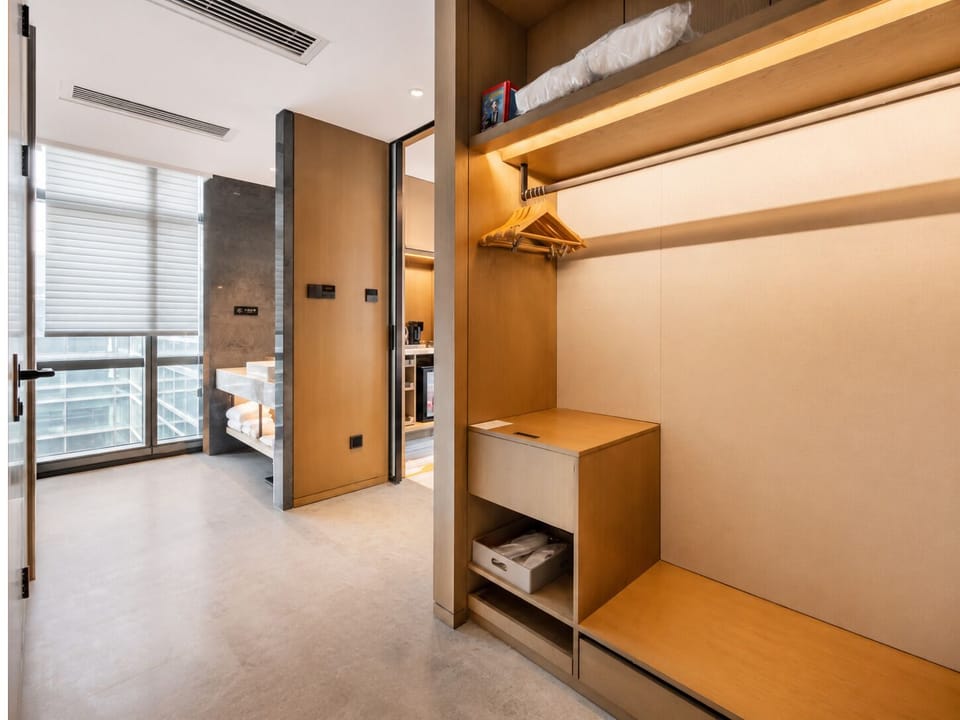 Junior Suite | Living area | 55-inch LCD TV with cable channels