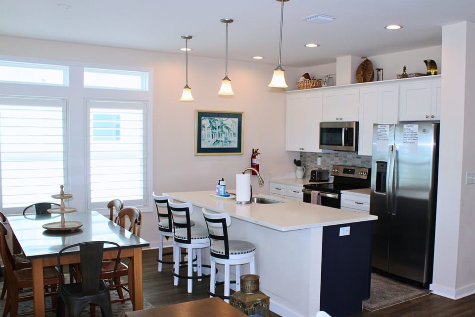 Kitchen: Bright, stylish space perfect for culinary adventures and family gatherings!