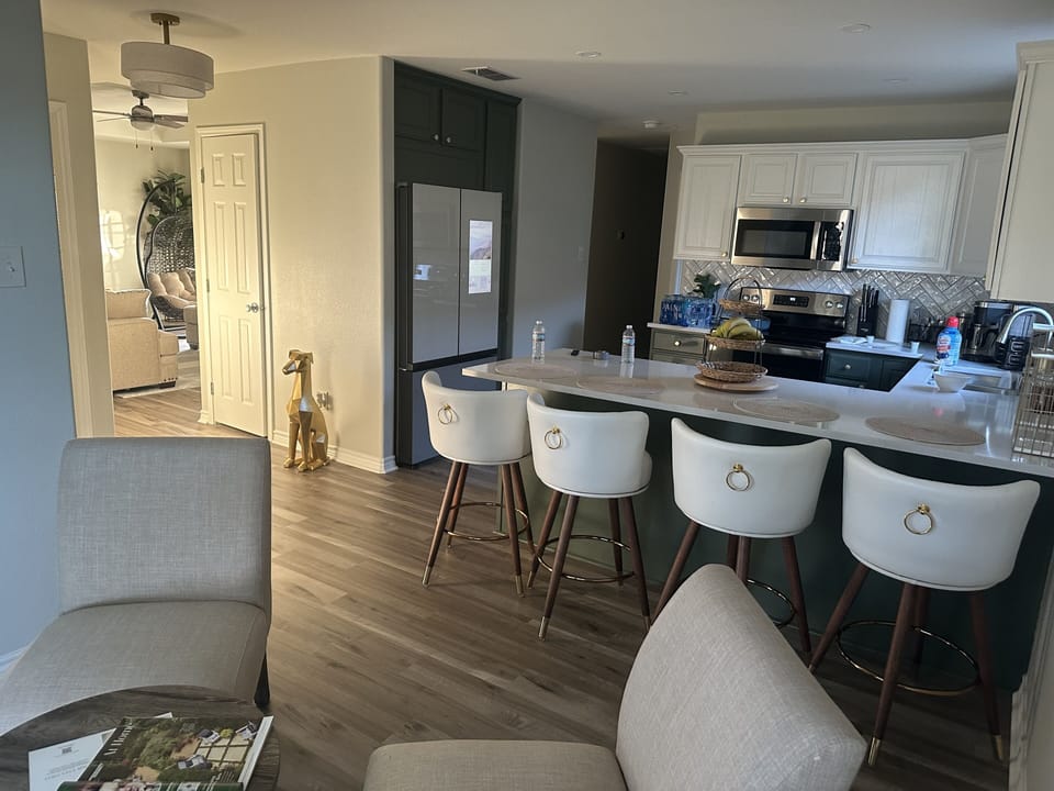 Smart refrigerator with Tv and Alexa built in. Helps with cooking or music.