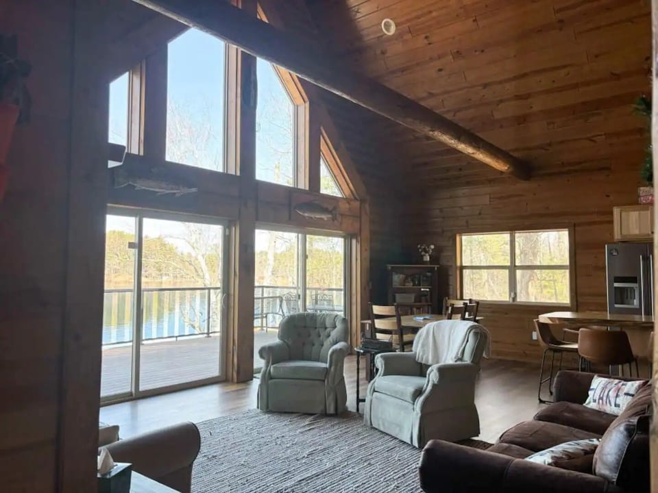 Take a load off in the open concept living room. Enjoy the serene lake view.