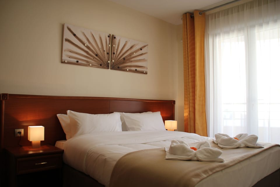 Family Room, 1 Bedroom, Non Smoking, Balcony | Minibar, in-room safe, individually decorated, individually furnished