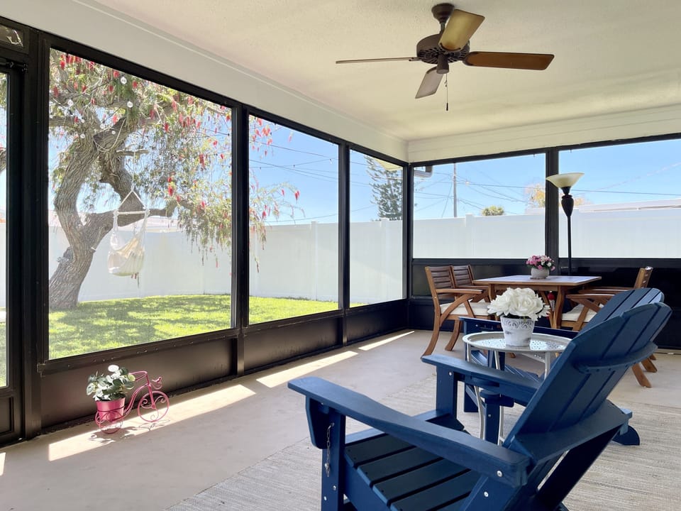 Covered lanai with outdoor table to enjoy family meals or a nice cup of coffee.
