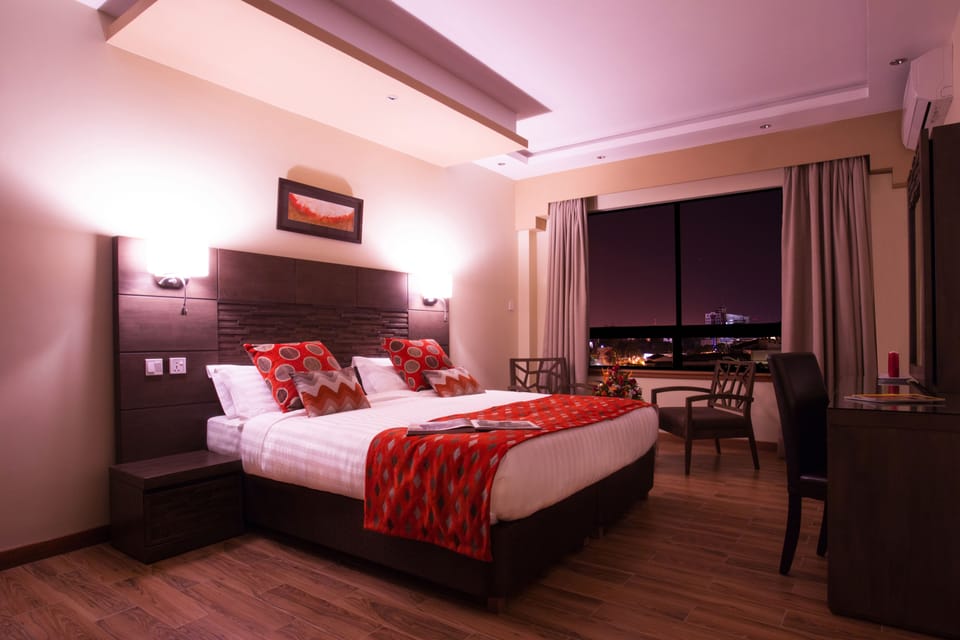 One Bedroom King Suite  | Premium bedding, in-room safe, desk, blackout drapes