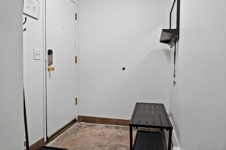 The view of the entryway is where you will find a bench, coat rack, and a large closet for storing your outdoor gear.