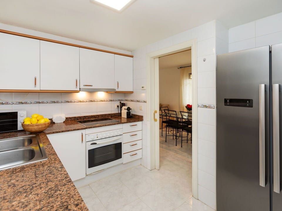 Cabinetry, Countertop, Furniture, Kitchen Stove, Kitchen, Wood, Interior Design, Kitchen Appliance, Home Appliance, Major Appliance