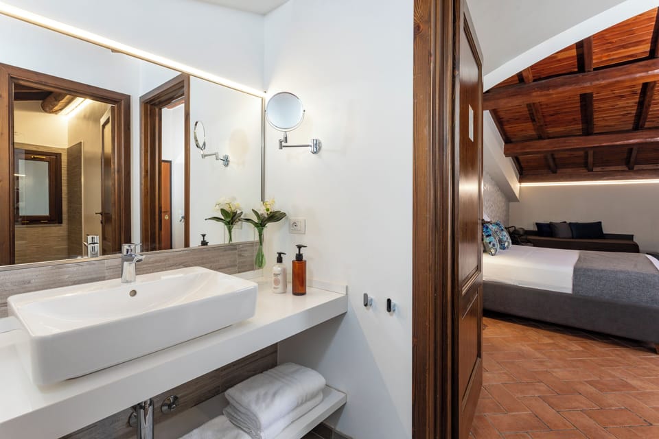 Family Room, Terrace (Zagara Bianca) | Bathroom | Shower, rainfall showerhead, free toiletries, hair dryer