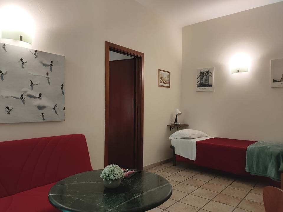 Standard Suite | Living area | 32-inch Smart TV with satellite channels