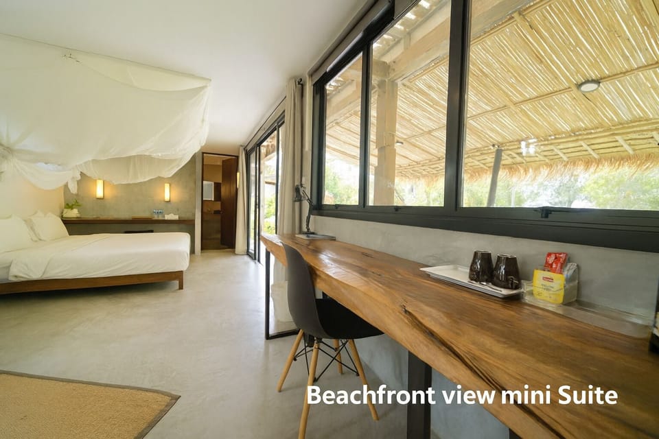 Beachfront View Mini Suite | Minibar, in-room safe, free WiFi, bed sheets