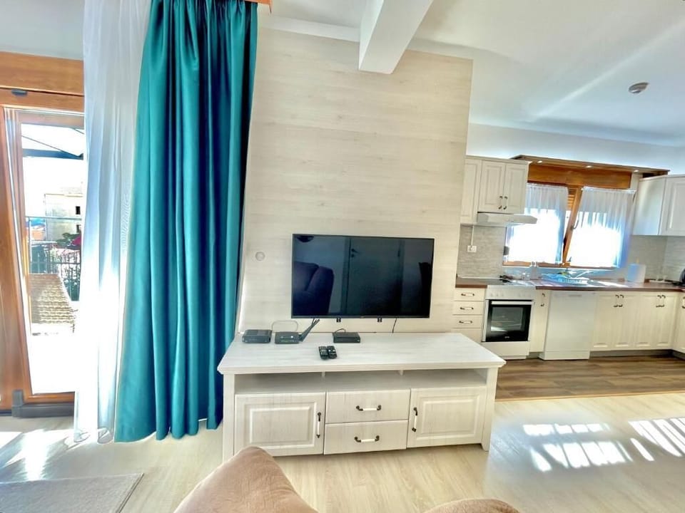 Deluxe Villa | Living area | 32-inch LCD TV with cable channels