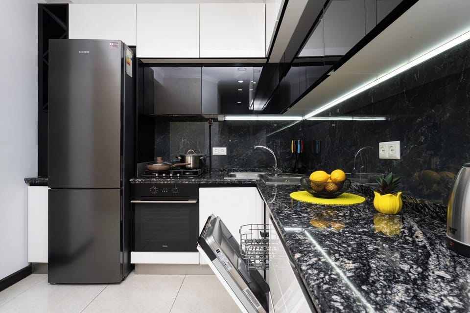 Family Apartment | Private kitchen | Fridge, stovetop, electric kettle, griddle