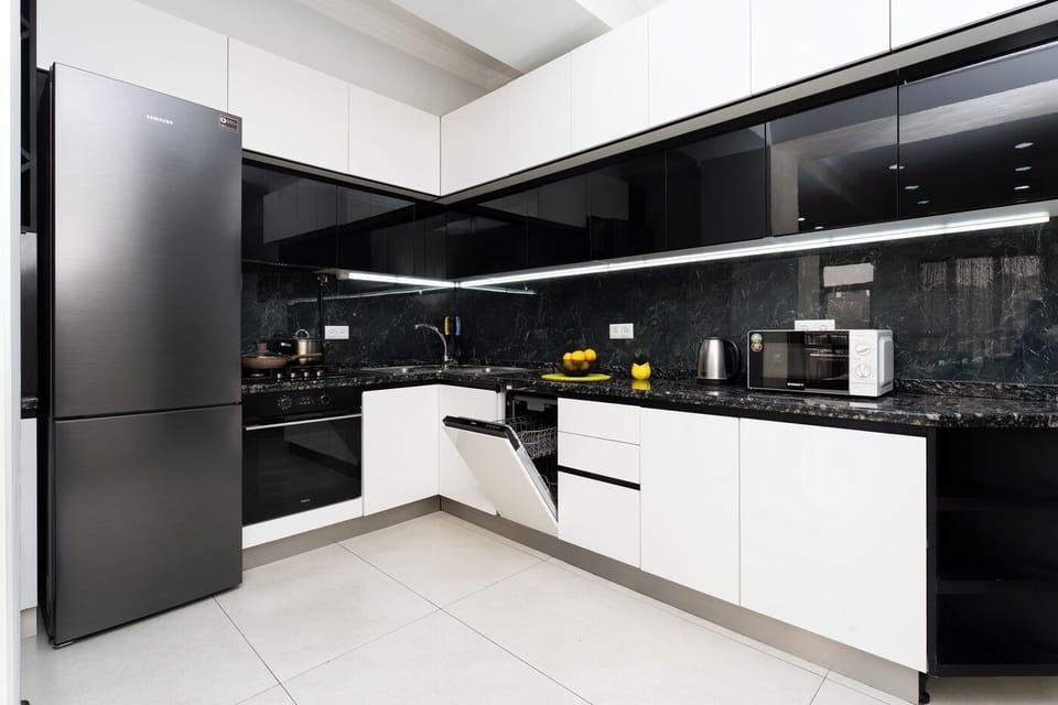 Family Apartment | Private kitchen | Fridge, stovetop, electric kettle, griddle