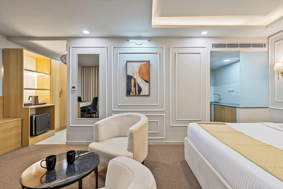 Superior Studio Suite | Living area | 40-inch Smart TV with digital channels
