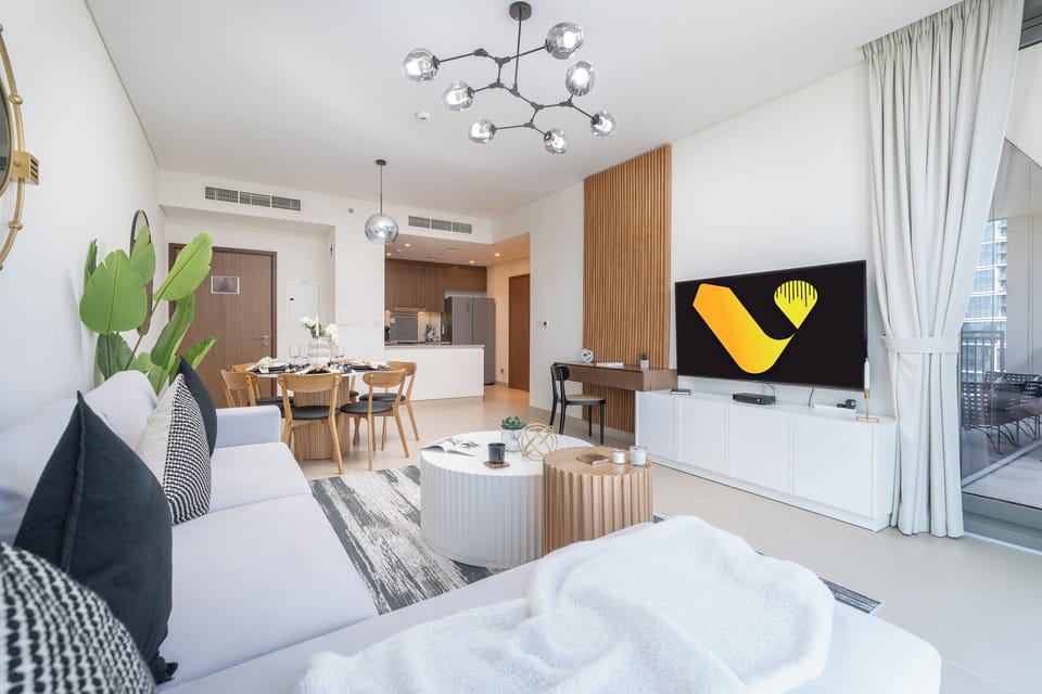 Elite Apartment | Living room | 65-inch LED TV with cable channels