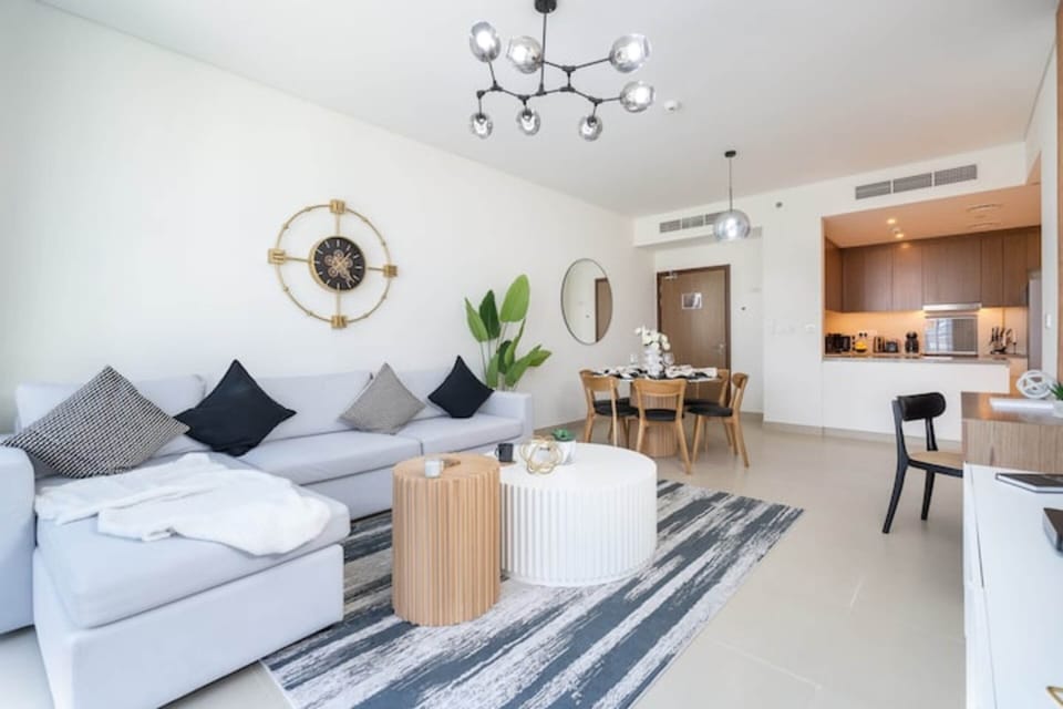 Elite Apartment | Living area | 65-inch LED TV with cable channels