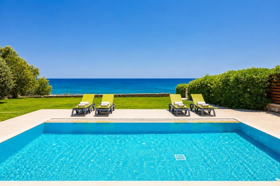 Private pool, terrace, and garden with sea views