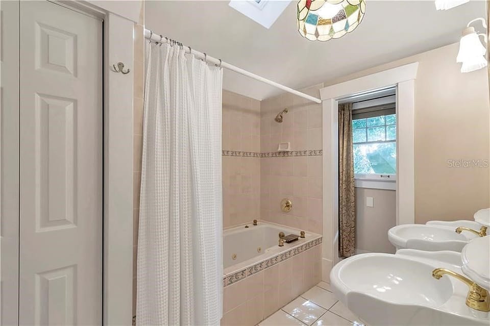 Double Sinks and Large Tub with Shower