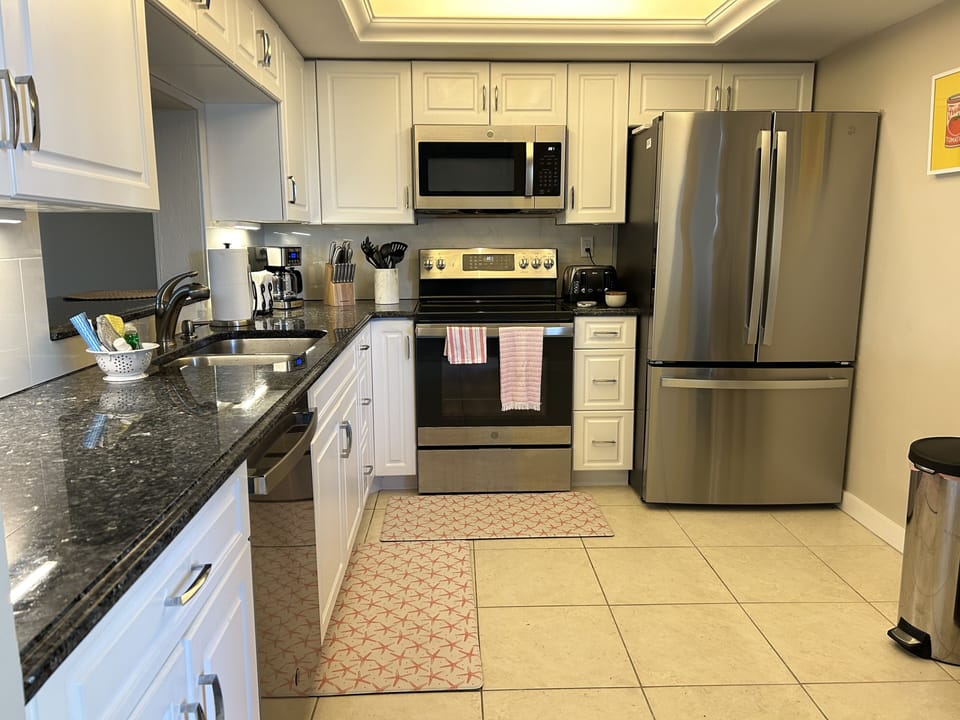 Kitchen features all new appliances, great cooking space. Wine fridge.
