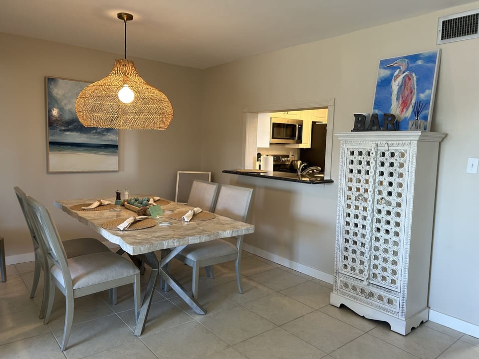 Dining room with pass through window to kitchen.